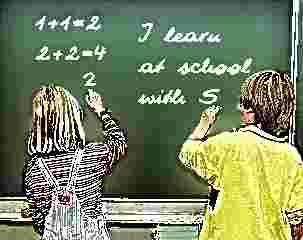 Schooldays: Pupils at school at the tablet / Copyright 2005 Heinz Riemer